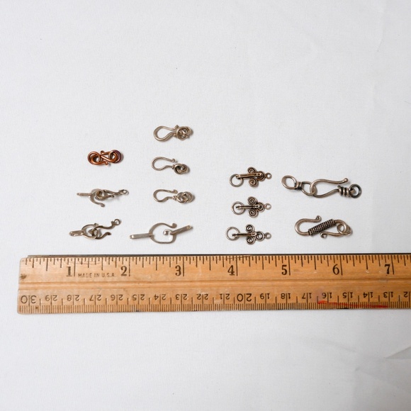 New - Bag of Silver Plated Pewter clasps for jewelry making - one is copper - Picture 1 of 1